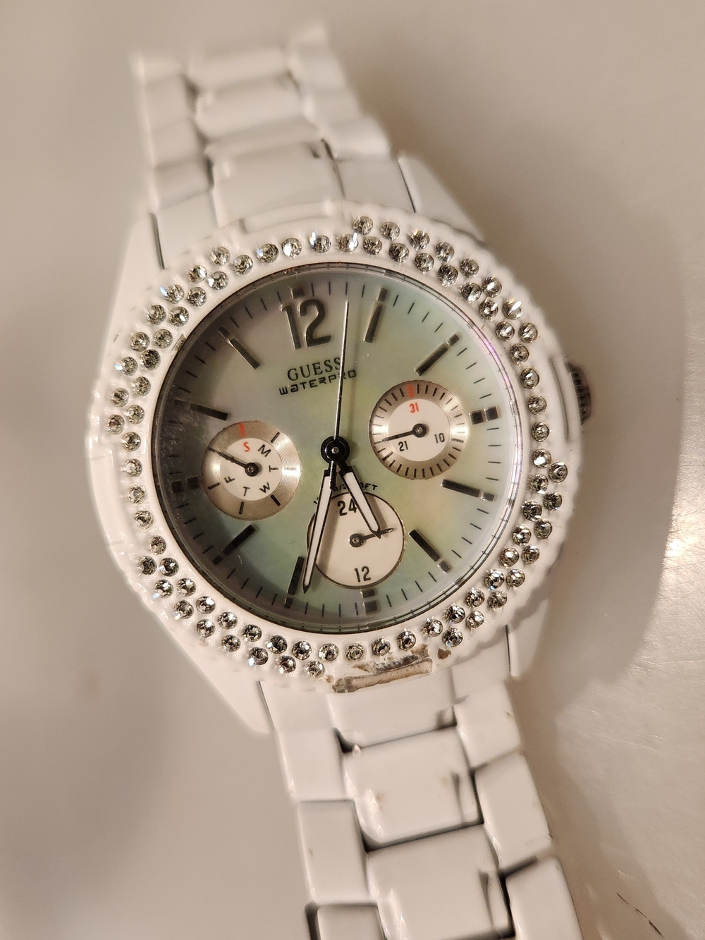 GUESS Women's White Crystal Bezel Ceramic Watch